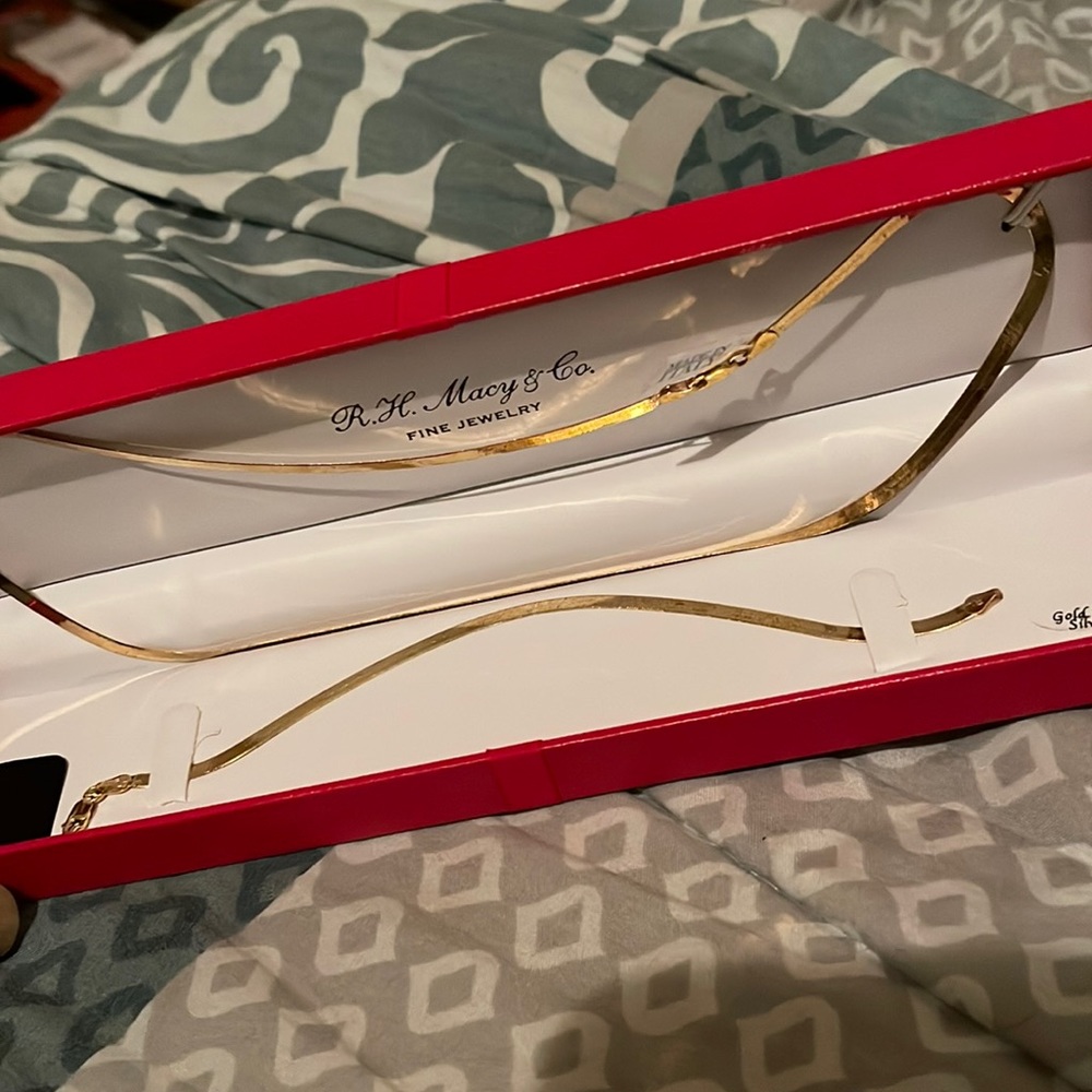 Brand new never worn gold necklace and bracelet set